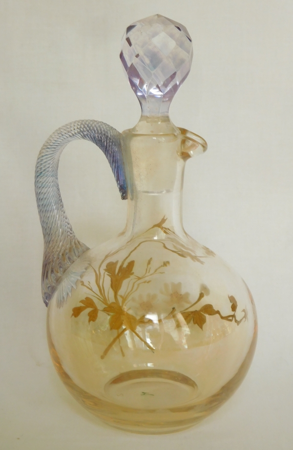Small Baccarat iridescent crystal bottle enhanced with enamelled and gilt flowers decoration