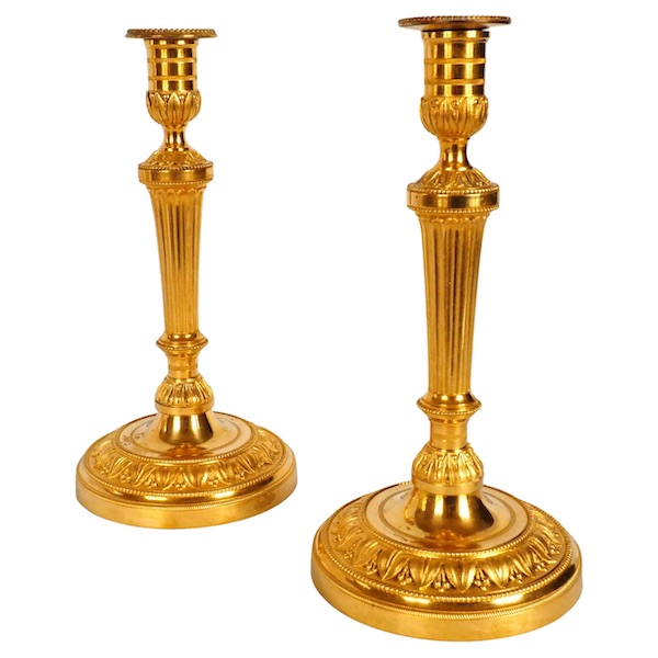 Pair of Louis XVI ormolu candlesticks, model of Fontainebleau Palace