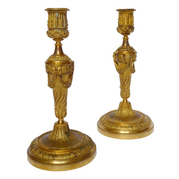 Pair of Louis XVI style ormolu candlesticks