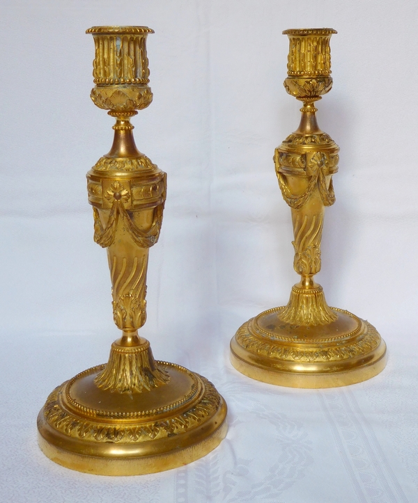 Pair of Louis XVI style ormolu candlesticks