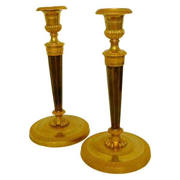 Pair of Empire ormolu and patinated bronze candlesticks attributed to Ravrio, early 19th century