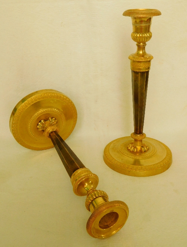 Pair of Empire ormolu and patinated bronze candlesticks attributed to Ravrio, early 19th century
