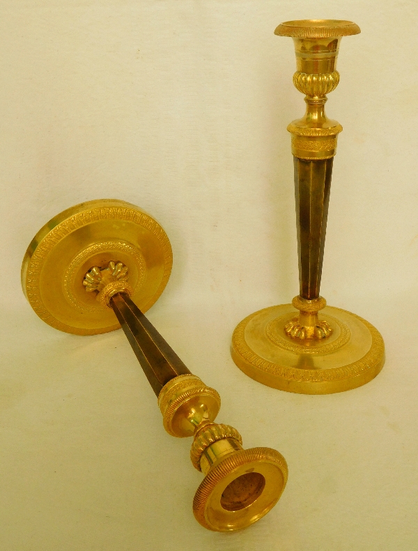 Pair of Empire ormolu and patinated bronze candlesticks attributed to Ravrio, early 19th century