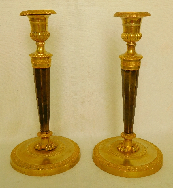 Pair of Empire ormolu and patinated bronze candlesticks attributed to Ravrio, early 19th century