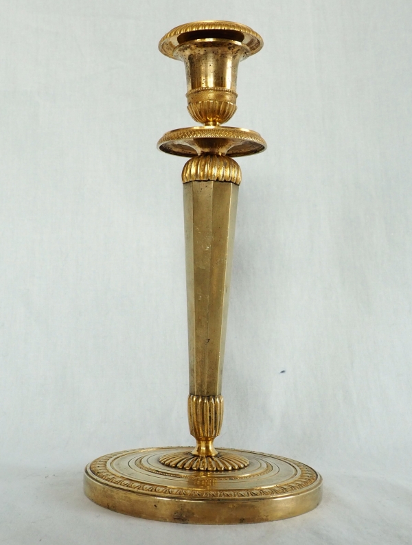 Ravrio : Pair of Empire ormolu candlesticks, early 19th century