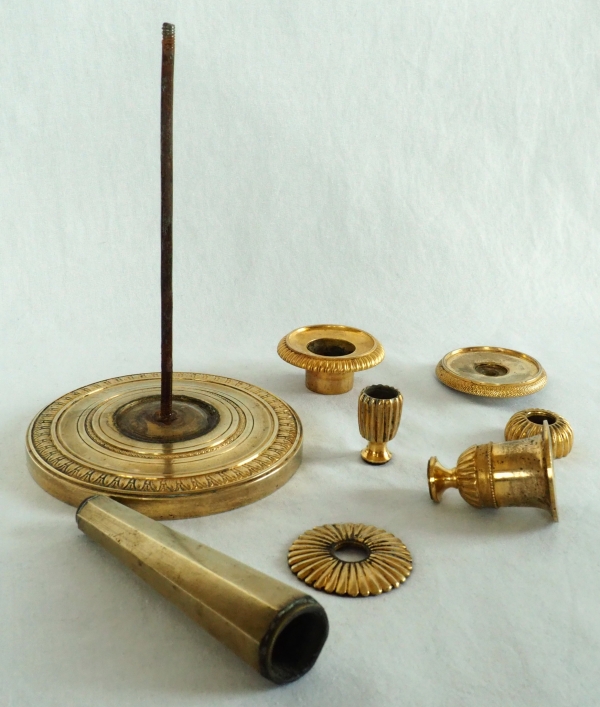 Ravrio : Pair of Empire ormolu candlesticks, early 19th century