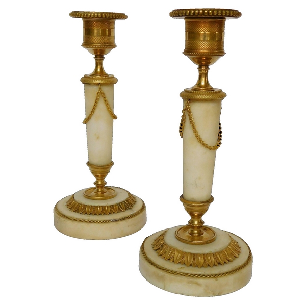 Pair of marble and ormolu candlesticks, end of Louis XVI production