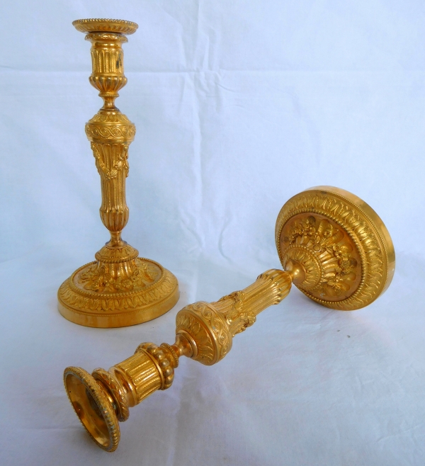 Pair of Louis XVI style ormolu candlesticks - 19th century