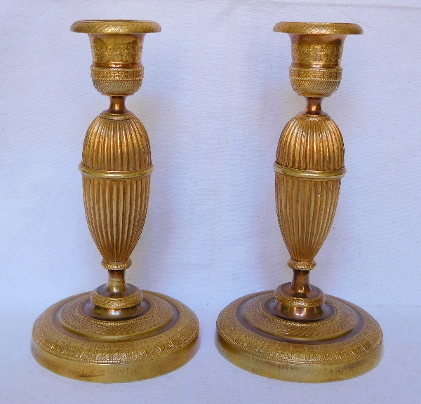 Pair of Empire ormolu candlesticks, early 19th century