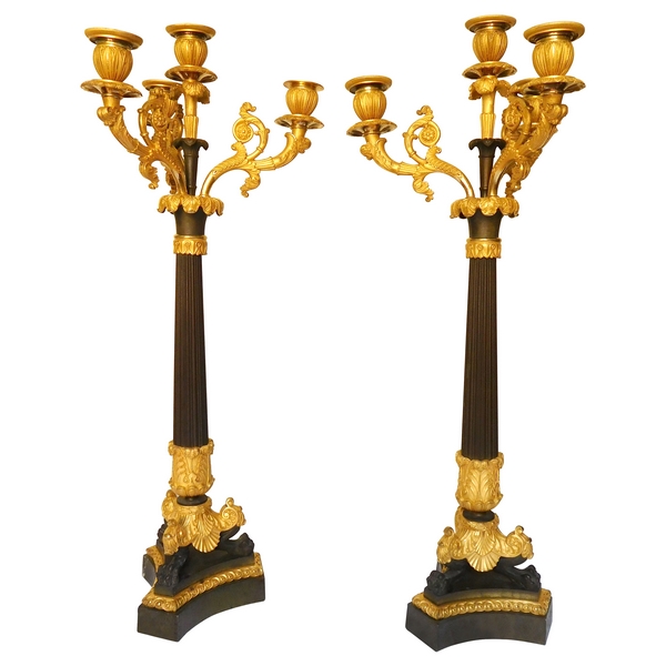 Pair of French Empire ormolu and patinated bronze candelabras, early 19th century