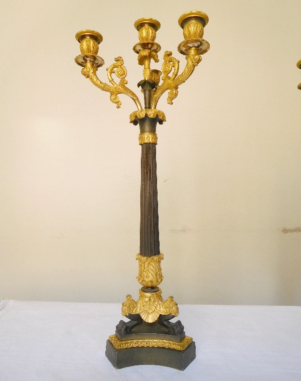 Pair of French Empire ormolu and patinated bronze candelabras, early 19th century