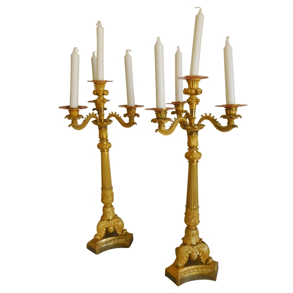 Pair of French Empire ormolu candelabras, early 19th century