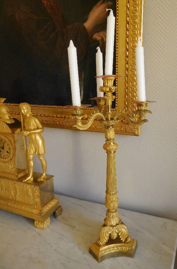 Pair of French Empire ormolu candelabras, early 19th century