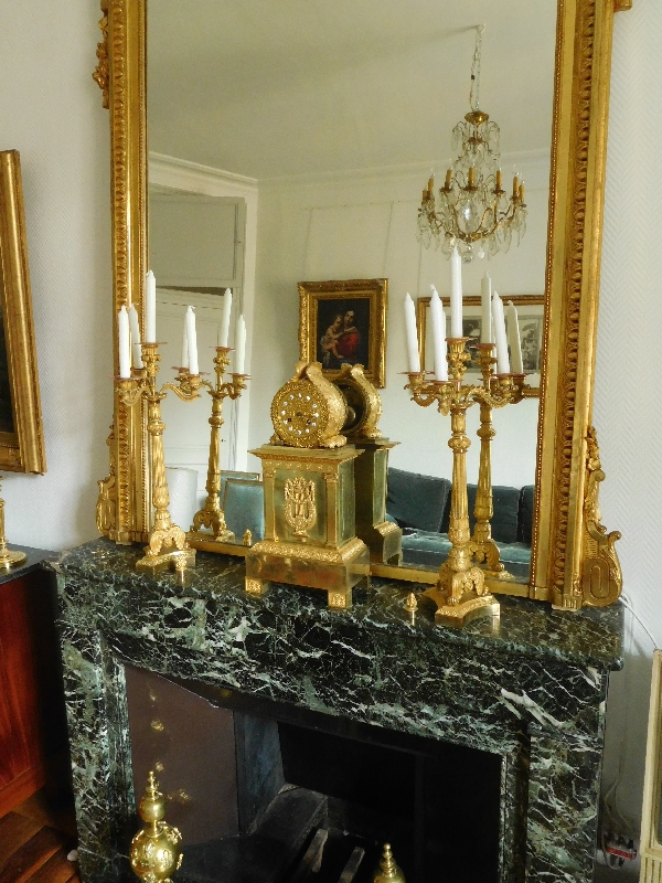 Pair of French Empire ormolu candelabras, early 19th century