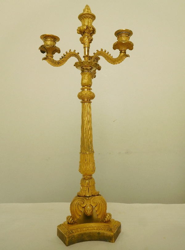 Pair of French Empire ormolu candelabras, early 19th century