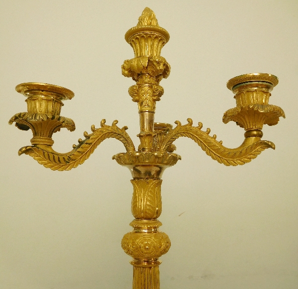 Pair of French Empire ormolu candelabras, early 19th century