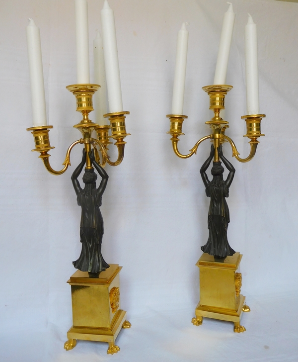 Paire de candélabres 4 feux en bronze patiné et doré au mercure d'époque Empire Restauration