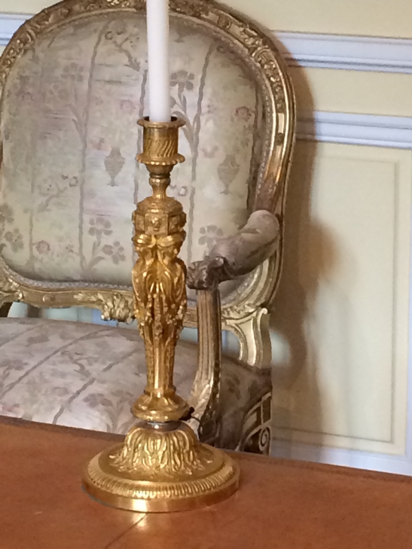 Pair of ormolu Louis XVI style candlesticks, after Jean Demosthene Dugourc