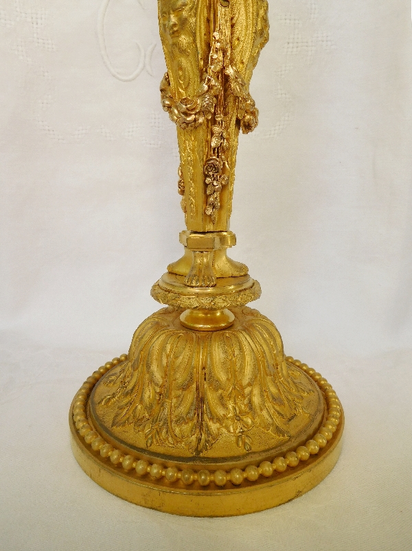 Pair of ormolu Louis XVI style candlesticks, after Jean Demosthene Dugourc