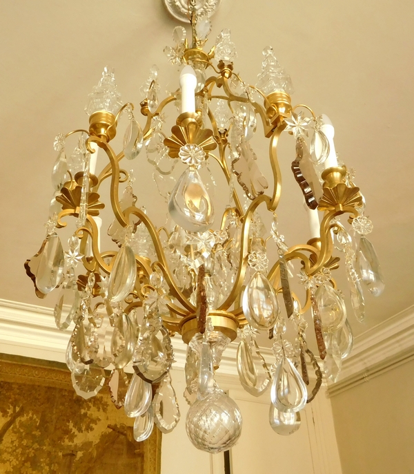 Grand lustre corbeille de style Louis XV à 12 feux, bronze doré et cristal taillé, Maison Bagues