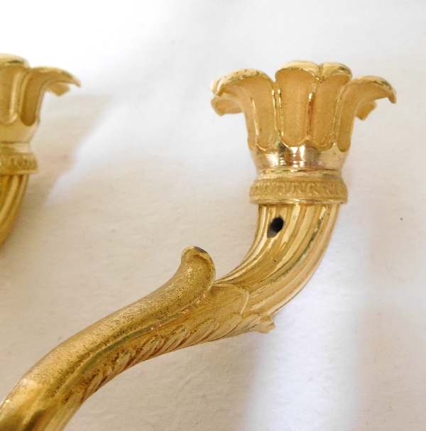 Pair of Empire ormolu and patinated bronze wall lights, early 19th century