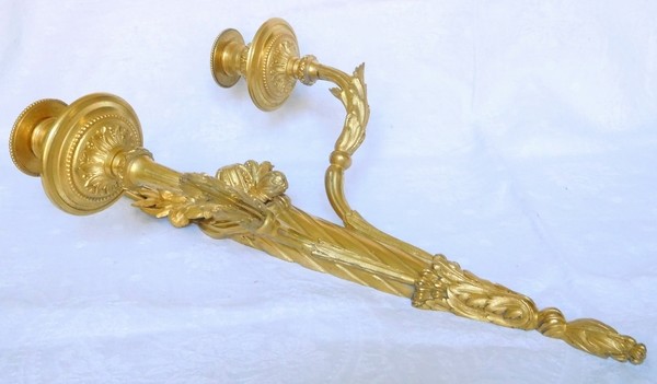 Pair of Louis XVI style ormolu wall lights, Napoleon III period - 19th century - 46cm