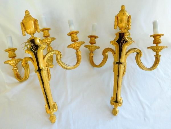 Pair of tall Louis XVI style ormolu wall lights, 19th century production - 54cm