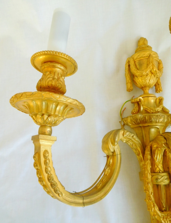 Pair of tall Louis XVI style ormolu wall lights, 19th century production - 54cm