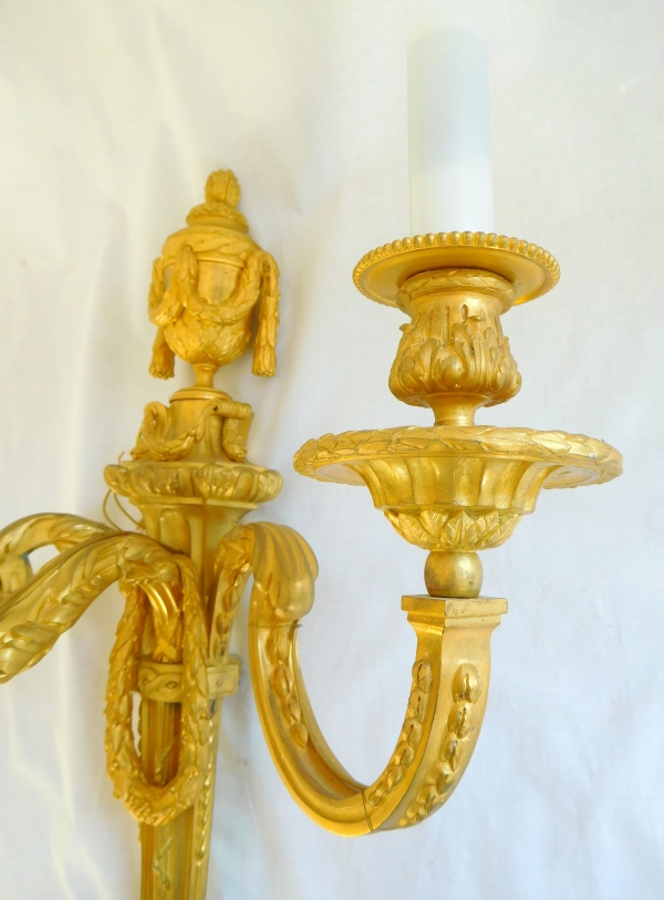 Pair of tall Louis XVI style ormolu wall lights, 19th century production - 54cm