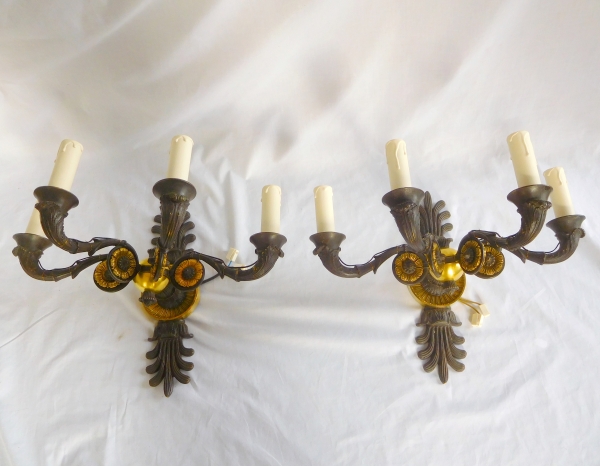 Pair of Empire style ormolu and patinated bronze wall lights, 19th century production