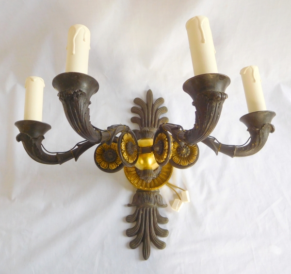 Pair of Empire style ormolu and patinated bronze wall lights, 19th century production