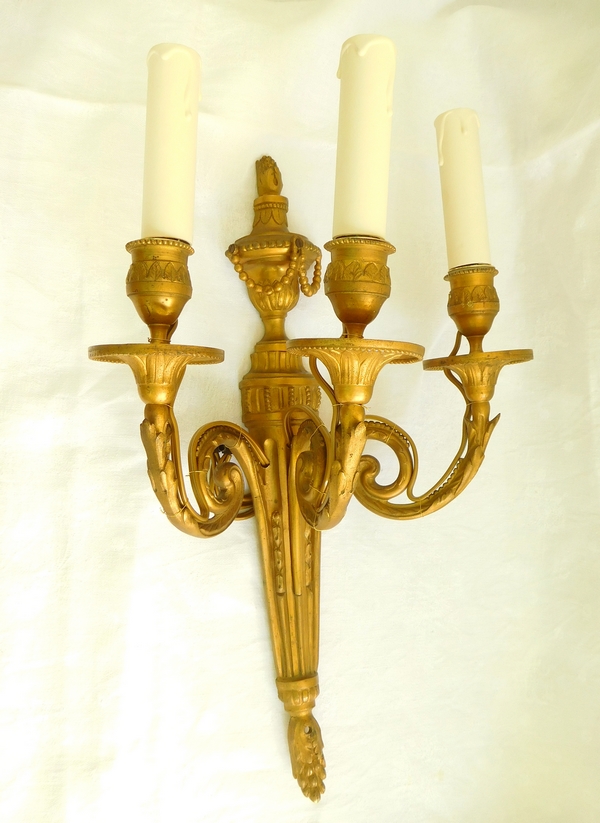 Pair of Louis XVI style ormolu wall lights, 3 lights, Chateau de Pontchartrain