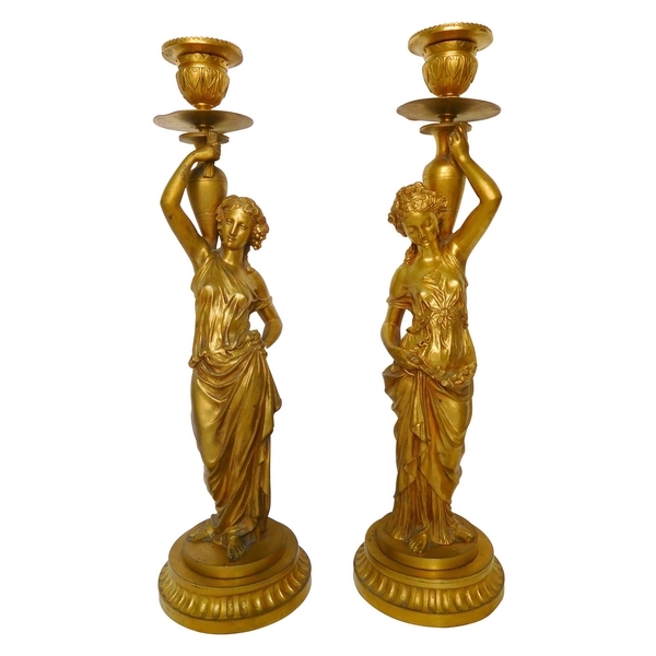 Tall pair of ormolu candlesticks picturing Bacchantes, Napoleon III production, mid 19th century