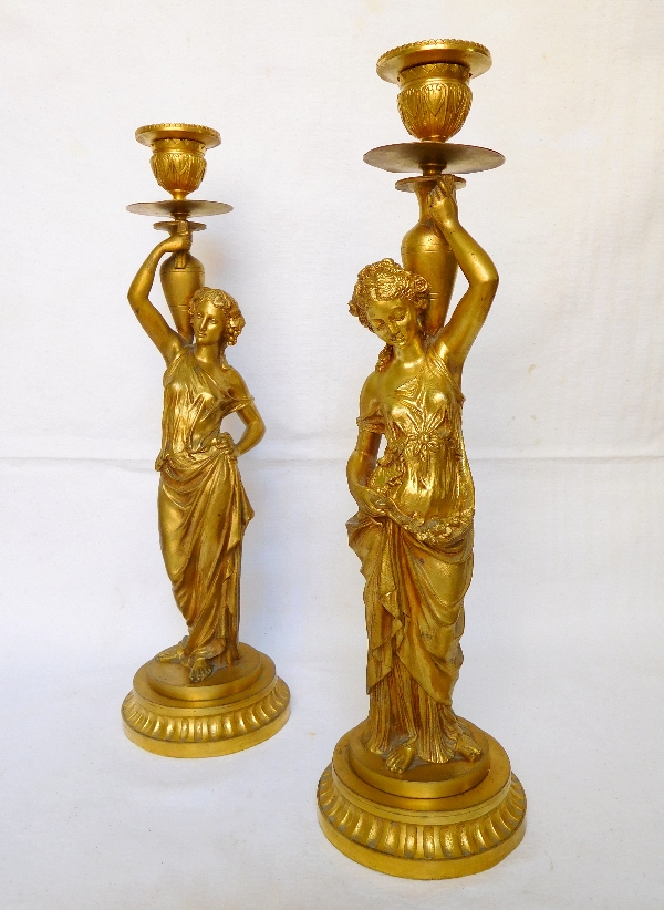 Tall pair of ormolu candlesticks picturing Bacchantes, Napoleon III production, mid 19th century