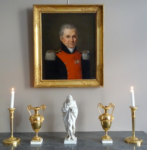 Pair of Empire ormolu candlsticks, early 19th century circa 1810