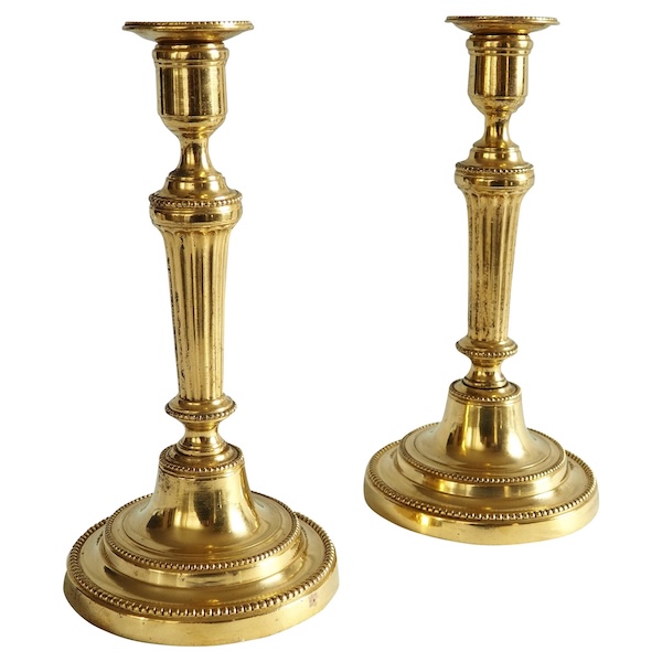 Pair of Louis XVI ormolu candlesticks, mercury gilt, 18th century circa 1780
