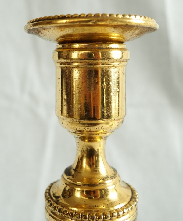 Pair of Louis XVI ormolu candlesticks, mercury gilt, 18th century circa 1780
