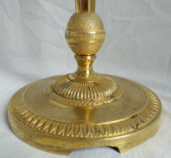 Ravrio : paire de flambeaux bougeoirs Empire en bronze doré variante Château de Fontainebleau