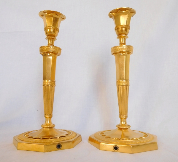 Ravrio : pair of ormolu candlesticks, Directoire period, late 18th century or circa 1800