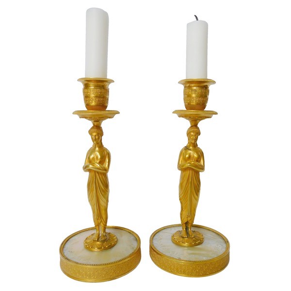 Pair of ormolu and mother of pearl Empire candlesticks, early 19th century