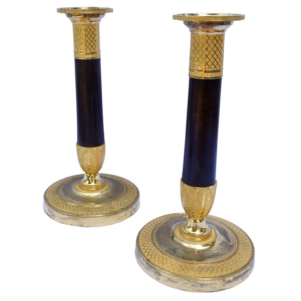 Pair of Empire ormolu and patinated bronze candlesticks, 19th century circa 1810