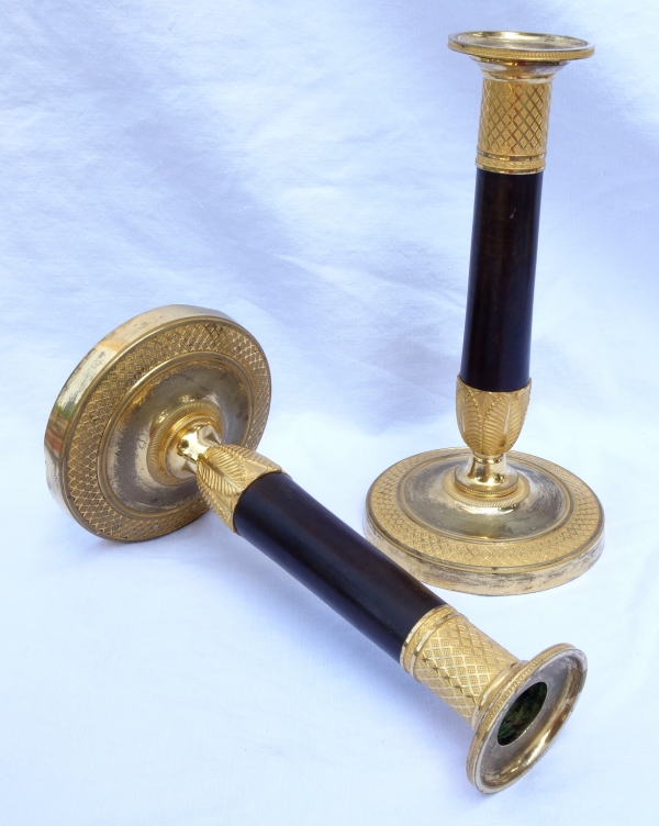 Pair of Empire ormolu and patinated bronze candlesticks, 19th century circa 1810