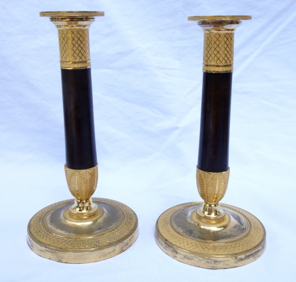 Pair of Empire ormolu and patinated bronze candlesticks, 19th century circa 1810