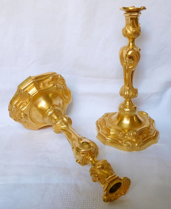 Pair of Louis XV style ormolu candlesticks after Meissonnier