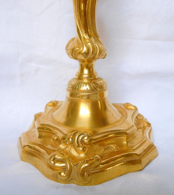 Pair of Louis XV style ormolu candlesticks after Meissonnier