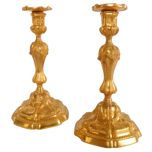 Pair of Louis XV style finely chiseled ormolu candlesticks, 19th century