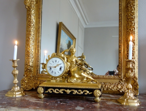 Pair of Louis XV style finely chiseled ormolu candlesticks, 19th century