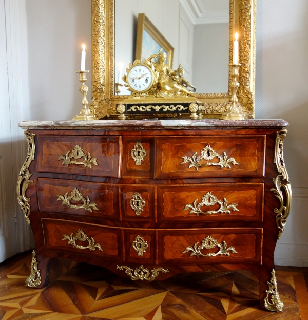 Pair of Louis XV style finely chiseled ormolu candlesticks, 19th century