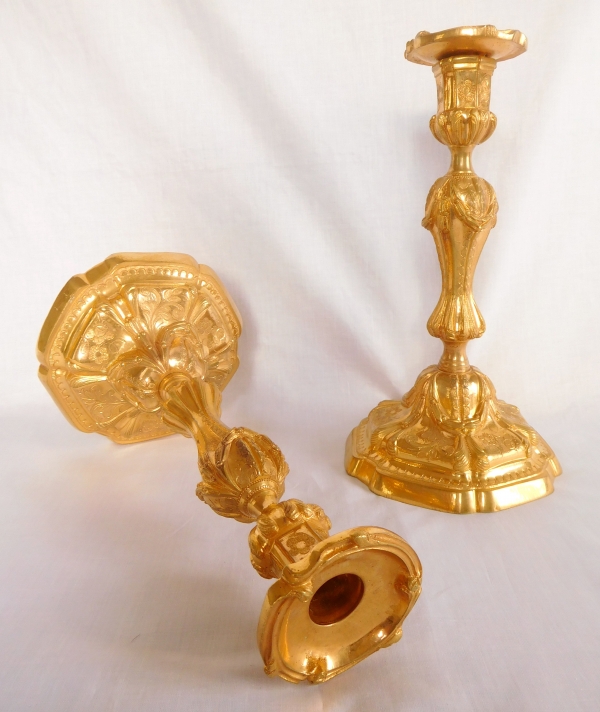 Pair of Louis XV style finely chiseled ormolu candlesticks, 19th century