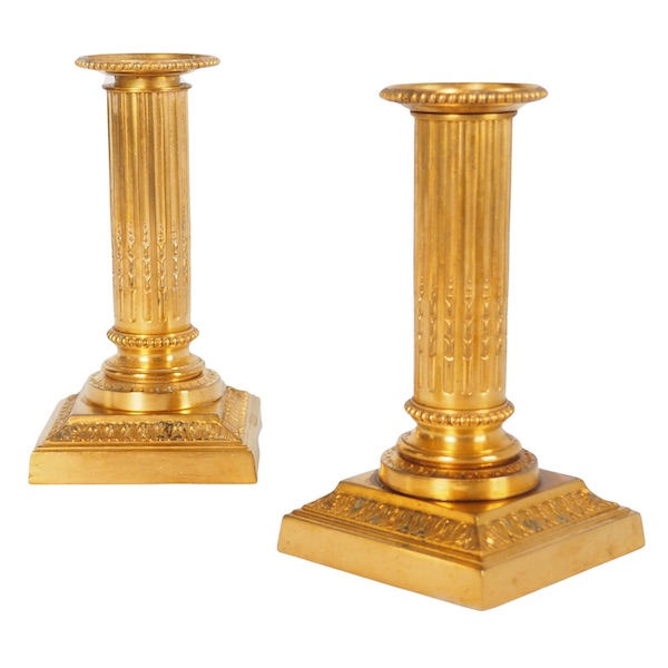 Pair of Louis XVI style ormolu candlesticks - 19th century